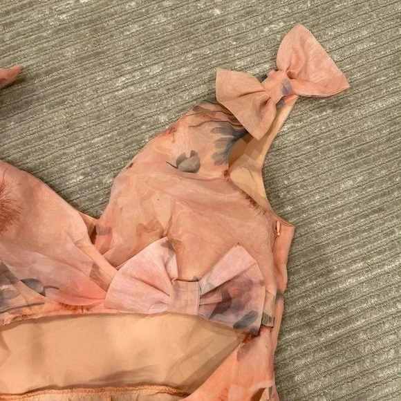 ASOS LUXE bow prom selkie
skirt mini sun dress in floral off shoulder cutouts - Picture 4 of 9